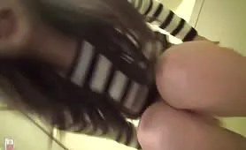 Dark haired teen shitting on bathroom floor
