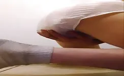 He's shitting in white diapers