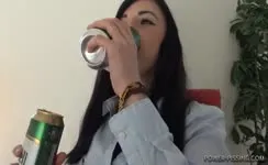 Dark haired beauty shitting