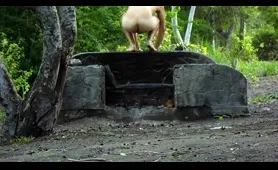 Hottie craps in outdoor setting