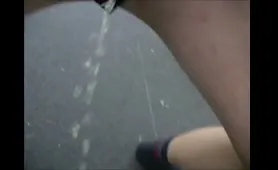Man Shits and Pisses in the Road