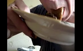 Guy Puts Tongue in Shit