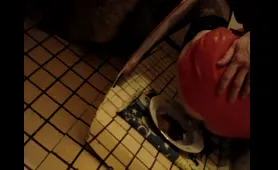 Guy Shits in tight latex