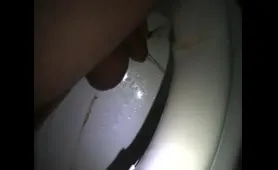 Guy Shits Over the Toilet