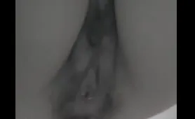 Woman pees in close up