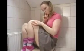 A Woman Drops a Load in the Bathroom