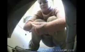 Woman Shits on Train Toilet