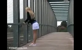 Blonde Woman Pisses on the Bridge