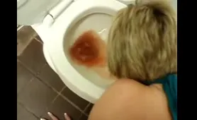 Woman Vomits Red Wine and Poops