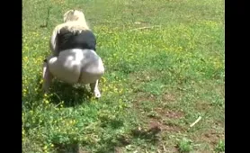 Chubby Lady Shits in Field