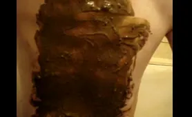 Lady Rubs Shit on Her Belly