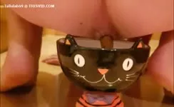 Shitting in a glass bowl