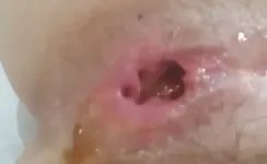 Close up of his wife pooping