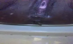 Ebony girl pooping on bathroom floor