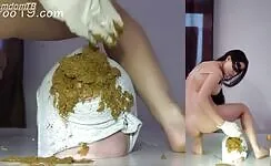Sexy Asian bitch pooping on the slave's face 