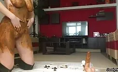 Sexy busty brunette chick rubbing shit all over her body 