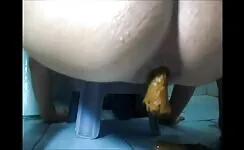 Naughty big ass lady pooping in the toilet 
