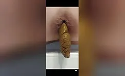 Naughty chick pooping in the toilet 
