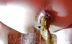 Sexy fat ass lady pooping in closeup 