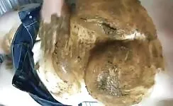 Playing with her stinky shit 
