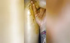 Fingering her horny pooper 