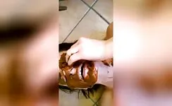 Mature whore rubbing shit on her face 