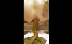 Shitting an unbelievable quantity of long poo 