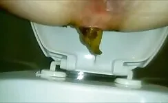 Lovely asshole pooping big turd 