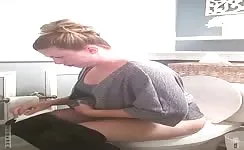 Blonde slut shitting
