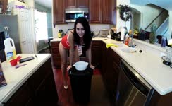 Brunette girl shitting in a trash can