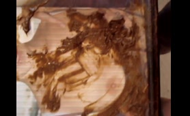 Woman Shits on a Picture