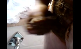 Lady smears cum on her skin