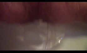 Lady drops a lengthy load in the bathroom
