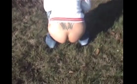 A Lady Drops a Load on the Lawn