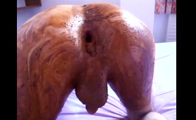 Hottie drops a nasty load into a condom