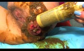 Woman Inserts Shampoo Bottle in Her Ass, Then Shits