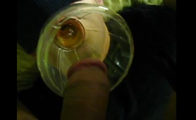 Man Pees into a Funnel