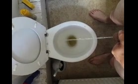 Gay Guy Pees in the Toilet