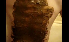 Lady Rubs Shit on Her Belly