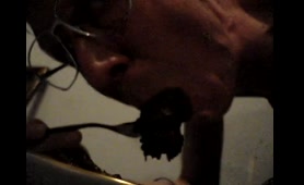 Woman Gives Herself a Scat Blowjob