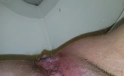 Close up of sexy wife shitting