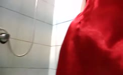 Blonde babe wearing a tight red dress shitting