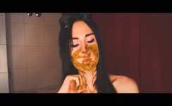She smears shit on her face
