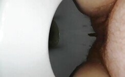 Hairy wife shits in close up