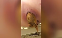 Closeup of hot ass pooping big load 