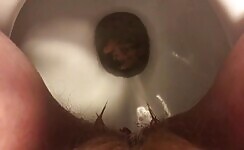 Amateur lady pissing in toilet 