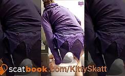 Woman shits and pisses on toilet